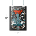 A poster that measure 11 inches by 17 inches that has the art for Shark Bite. It shows a skeleton missing an arm riding a shark that has a skeleton arm in its jaws.